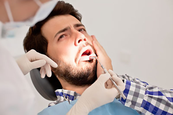 A Dentist Explains How To Treat TMD Pain