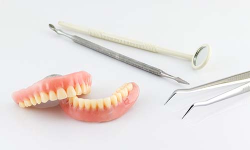 Why Should I Replace Missing Teeth With Dentures?